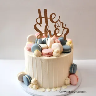 a cake decorated with macaroons