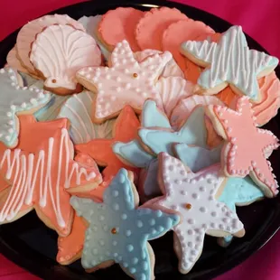a plate of decorated cookies
