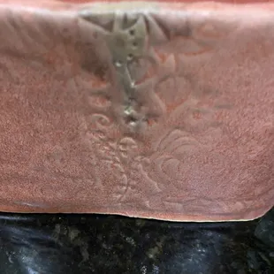 The wrong glaze color was dripped on my piece.