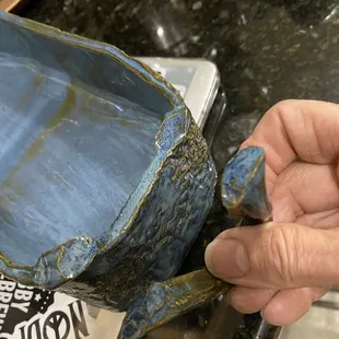 This shows that the handle was broken before glazing as the surfaces where it broke are heavily coated in glaze.