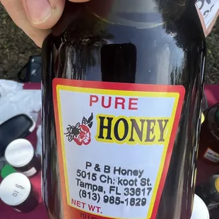 A nice gentleman sells his pure local honey