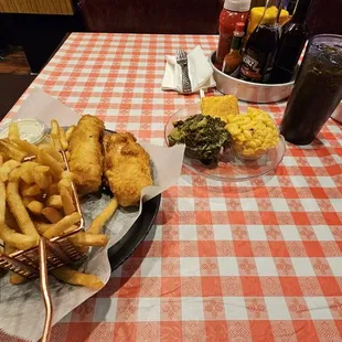 Fish and chips with greens and mac n cheese. They also gave me a piece of corn bread