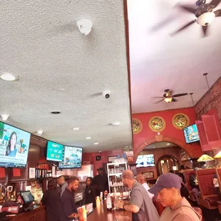 customers sitting at the bar