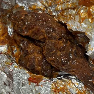 Wings are burnt dry, very hard tenders are burnt and dry. Also that cook needs to be fired Sweetwater Tavern on 10 mile.