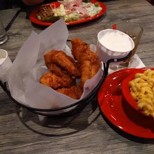 Beer battered fresh chicken tenders, coleslaw, Mac and cheese