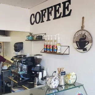 a coffee shop with a glass counter