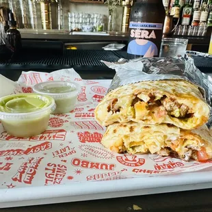 Quesadilla with fries, chicken adobo (best protein option) and both green sauce options