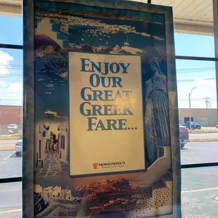 a sign in front of a window