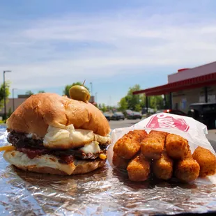 a burger and tater tots