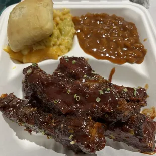 Ribs, roll, cheddar broccoli (rice), baked beans