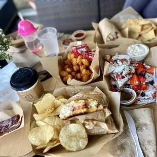 Breakfast Burrito, House Glazed Bacon, Tuna Melt Sandwich, Tater Tots, Hot Coffee, Classic French Toast