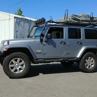 4" Rough Country lift, 35" tall mud terrains installed by Swier Tire - Jeep Unlimited 4x4