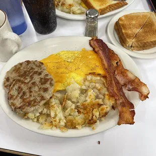 Big breakfast combo. With cheese on the scrambled eggs.