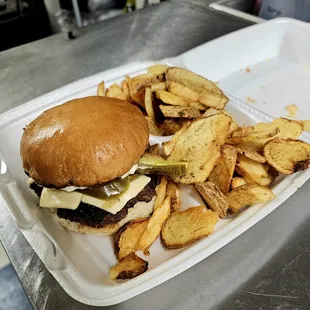 a plate of fries and a sandwich