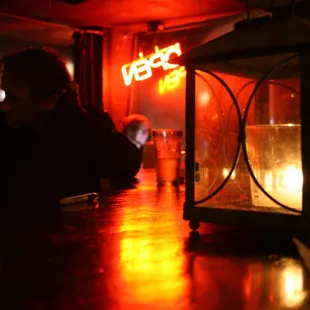 a woman sitting at a bar