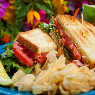 Classic BLT with 5 slices of bacon, two slices of ripe tomato, green leaf lettuce, mayonnaise, on lightly toasted semolina bread.  5.50