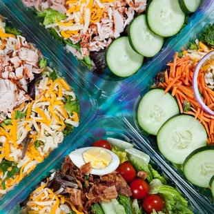Green salad selections in our grab n go cooler