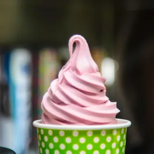 a cupcake with pink frosting