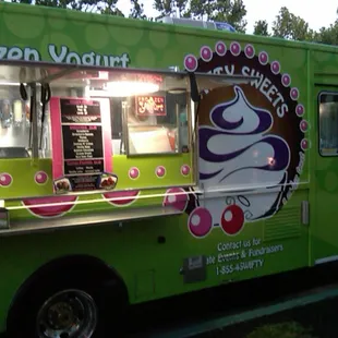 a green ice cream truck