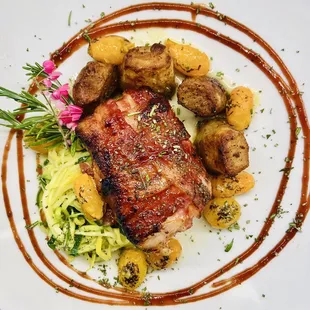 Bacon wrapped meatloaf, fondant potatoes and zucchini ribbons