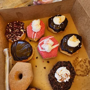 Miami vice(guava),beesnees(red velvet),strawberry crunch,holy cannoli,Boston cream,cinnamon sugar,kookoo for cocoa puffs, blueberry fritter.