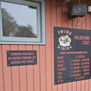 Exterior board for business hours as of 10-14-2023