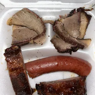 3 meat dinner with Ribs, Sausage and Brisket