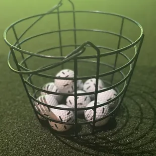basket of golf balls