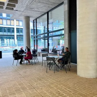 a group of people sitting at tables