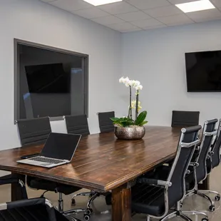 Our conference room is the perfect place to hold a business meeting, do homework or host a party!