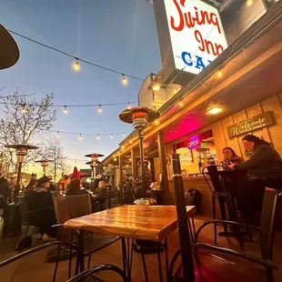 Tony on his guitar &amp; the Swing Inn Cafe sign.