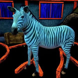 Large animals on and around the holes.