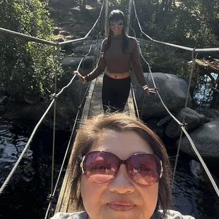 With my friend at Yosemite National Park Swinging Bridge