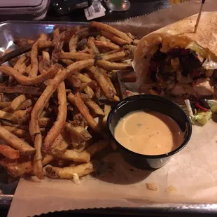 I had already been picking at the food and there was still a ton left. That spicy ranch sauce was so good that I would probably drink it.