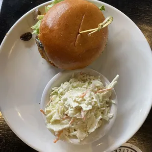 The grilled chicken sandwich with lettuce, chipotle, mayo, and sautéed mushrooms. Delicious also with a substitute of coleslaw versus fries