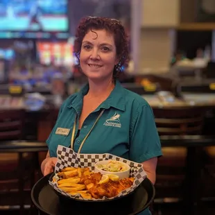 Everyone is smiling for all-you-can-eat-halibut and chips at Swinomish Sports Bar &amp; Grill!