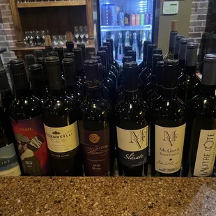 9/14/23 Yelp check in flights $10. Todays are the three bottles in back with the corks:)