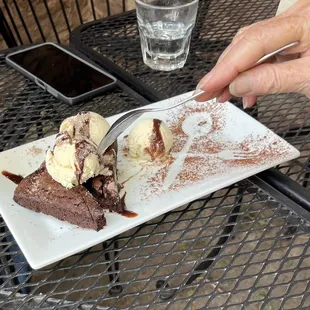 Homemade vanilla, ice cream and chocolate brownie