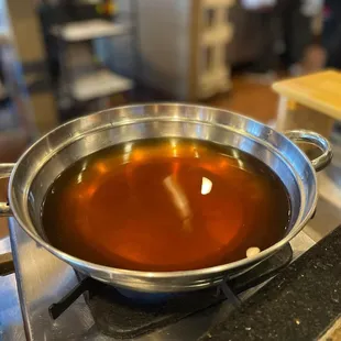 a pot of soup on a stove