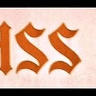 a glass of wine and the word swiss buda