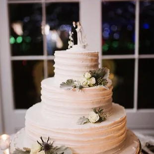 3 tier traditional wedding cake with pineapple filling which was very light and not overwhelming/overpowering
