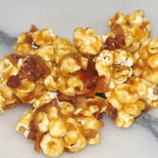 Our special recipe Caramel Corn infused with bits of Applewood Smoked Bacon.