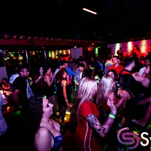 a crowd of people dancing