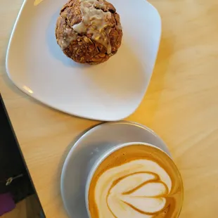 Latte with brown sugar syrup and almond milk and a carrot cake with maple.