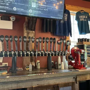 Main taps in taproom at bar.