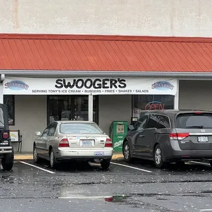 several cars parked in a parking lot