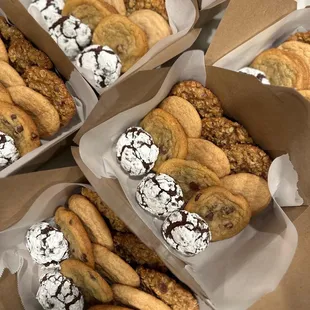 a variety of pastries in boxes