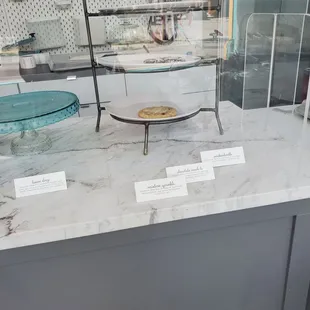 a marble counter top in a bakery