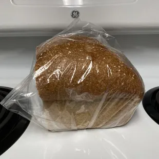 Half of the Honey Wheat Sour Dough bread loaf.