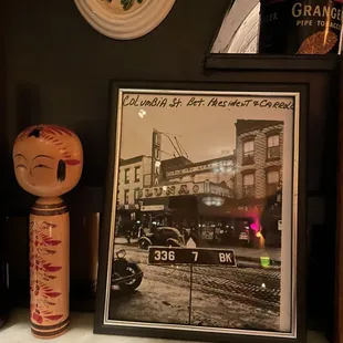 a photograph of an old car and other items